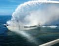 The DGzRS rescue cruiser "Berlin" in action for a burning sailing yacht in Hohwacht Bay