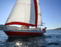 Test run in a light evening breeze off Mali Losinj. The wind steering system is still the original from the eighties