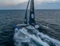 The Ultim trimaran "Maxi Banque Populaire" carries the Olympic flame across the Atlantic