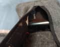 The battery is accessible via a zip on the back