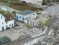 Le mur anti-inondation devant la station de pilotage a cédé