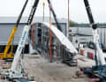 The cranes moved the future ketch into its natural position for the interior work and outfitting.