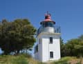 The small lighthouse at Spodsbjerg Fyr to the east of Hundested on the Kattegat.