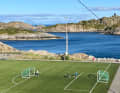 The football pitch very close to the sea.