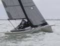 Pretty lines, little freeboard, pronounced deck leap. The graceful lines come from designer Michele Molino