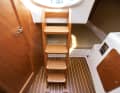 Companionway: Four steps down, like on a large boat. The cockpit is high, with plenty of space underneath
