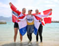 Here, Ilca 6 Olympic champion Marit Bouwmeester, Denmark's silver medallist Anne-Marie Rindom and Line Flem Høst from Norway celebrate their medals together