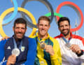 The Olympic Ilca 7 podium with two-time Olympic champion Matt Wearn, silver medallist Pavlos Kontides and Stefano Peschiera from Peru