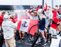 A well-earned champagne shower followed in the harbour.