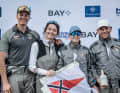 The victorious NRV crew around helmsman Tobias Schadewaldt (r.).