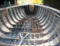 An aluminium boat is created from a frame and stringer skeleton, ...