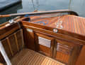 Mix of styles: in the cockpit there is a new tiller with carbon fibre next to plaques from the 1940s.