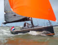 Test in strong winds. The helmsman works far forward directly on the superstructure, protected by the flexible disc.