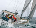The tare bracket holds the electric traveller and removes the mainsheet from the cockpit