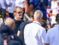 The British racing team owner and billionaire watches the action in the Cup metropolis of Barcelona.