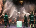 Here the Emirates Team New Zealand celebrates the successful Cup defence on Barcelona's stage