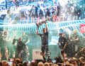 In October, Peter Burling won the America's Cup for the third time with Emirates Team New Zealand, and here he is lifting the heavy jug into the sky above Barcelona.