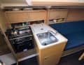 Nourished: It's not big, but everything is there - cooker with oven, fridge and sink. There is no worktop
