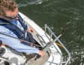 Secured to the pushpit with a lashing strap, the improvised rudder steered the best