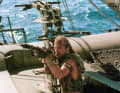 Costner on board, in the background the combination of grinder and tiller
