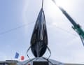 Here the futuristic foiler is still hanging in the crane