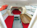 The table can be used indoors and outdoors. When lowered, it creates a double berth