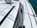 The genoa lifting point is adjusted via barber haulers. The handrail serves as a deflection