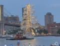The photo shows how a tugboat pushes the bow of the "Cuauhtémoc" around after casting off.