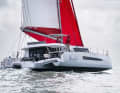 Up the leg. The tri always sails downwind with a slight heel. Upwind, the swimmer dives out