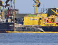 The salvage area resembles a floating construction site.