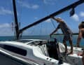 The mast of the "Black Marlin" is slowly raised to a vertical position using a jib construction