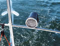 On the pushpit sits the tow log, which the skipper uses to determine the distance sailed.  It is one of his most important tools