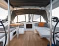 Sunbed at the touch of a button. The tables in the cockpit are electrically height-adjustable