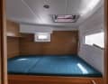 The berth of the aft cabin on the port side is arranged transversely