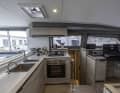 The galley with plenty of worktop space and a large four-burner hob will make professional chefs envious.