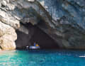 In many places, the sea has hollowed out the rocks. Some of these caves can be navigated by dinghy - an adventure!