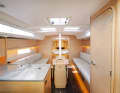 The feeling of space is superior to that of yachts of the same size. However, the vertical backrests of the saloon sofas offer little seating comfort in the long term