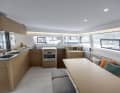 There is plenty of work space around the pantry and there is room for eight people around the table