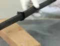 Once at the damaged area, the hose is milked, stretching the braid so that it fits tightly
