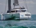 The surrounding window strip on the cabin superstructure is visually distinctive.
