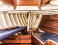 The forepeak contains the chain locker, a sea berth and a pipe berth, with a forecastle underneath. The interior and layout date from the year of construction