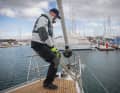 Push the mooring line through firmly using muscle power, then by machine