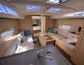 Saloon benches set as far out as possible, plenty of natural light, double doors to the foredeck - this is how Dufour accommodates a lot of volume in the hull, which is only 33 feet long