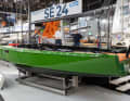 Modern lines. Wide stern, retracted stern, flat underwater hull