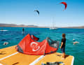 Three platforms tied together at the stern are the take-off and landing runway for the kiters