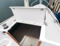 The companionway is closed by a hinged hatch