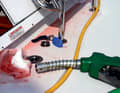 Check diesel spill: This sight almost smells - fuel spilt during refuelling