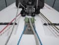 The lifting keel is raised via a bulkhead buoy. The carbon fibre mast can be folded on deck and can also be set by hand