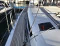 View aft over the "sloping" side deck, which did not yet exist in sailing yacht construction