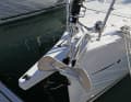 Not particularly attractive, but practical: if you anchor a lot, you can leave the ground anchor attached to the bow. The fixed bowsprit is an option